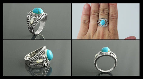 Une bague bohème en argent avec une pierre turquoise et une incrustation de nacre blanche de chaque côté. La bague est potée sur une main feminine.