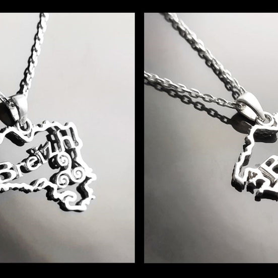 two views of a silver necklace with a pendant shaped like the outline of the state of  'Breizh' (Brittany) in France. The pendant has the word 'Breizh' written inside the outline.
Brand: KRAMIKE
Product: Brittany map necklace / Breizh pendant
Metal: 925 sterling silver
Pendant size: 3.0 × 2.0 cm
Weight: 3.6 g
Symbol: Triskel (center detail)
Chain options: 45 cm / 50 cm / 55 cm
Ships from: France
Tracking: included