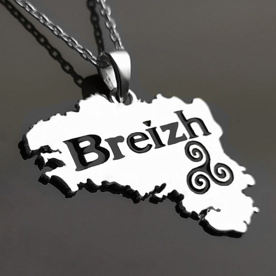 Silver necklace with a pendant shaped like the region of Brittany, France. The pendant features the word "Breizh" and a Celtic knot design.

Brand: KRAMIKE
Type of jewelry: Pendant
Metal: 925 sterling silver
Size: 20×30 mm
Handmade: yes
Ships from: France
Necklace: chain on request

Brittany pendant, French regional gift, French Souvenir, Brittany gift, Breizh Necklace, Breizh pendant, Brittany jewelry, Bretagne pendant, Bretagne gift, French Brittany gift, Brittany necklace