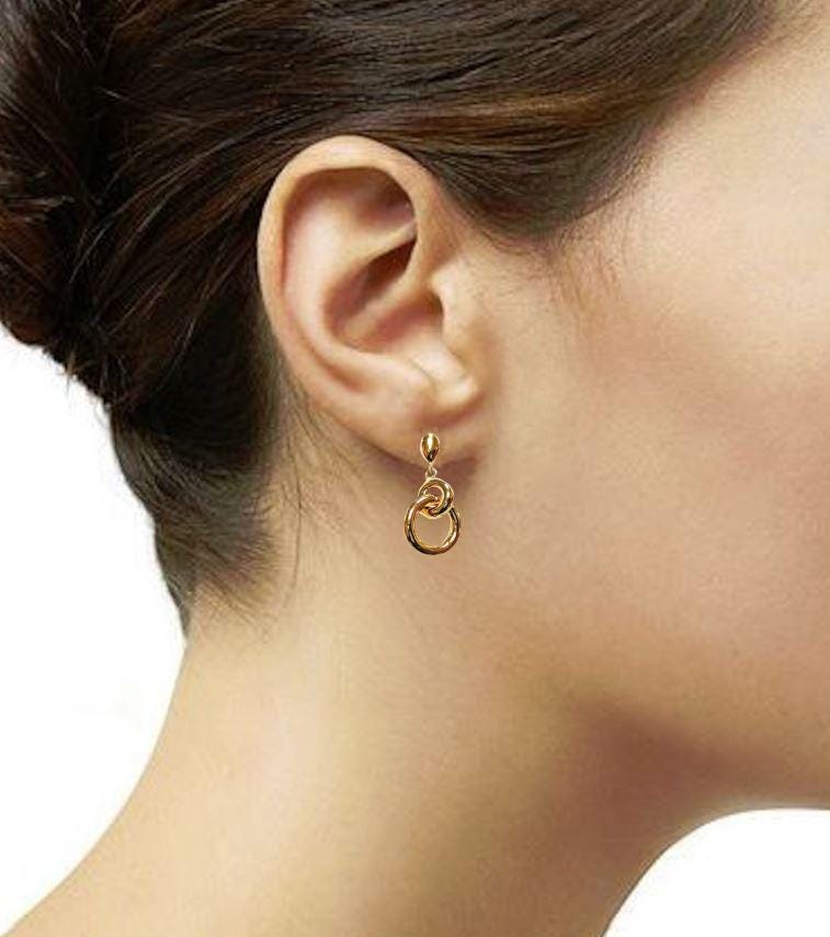 Double gold hoop earrings • Modern 18K gold-plated drop earrings • Interlocking hoops