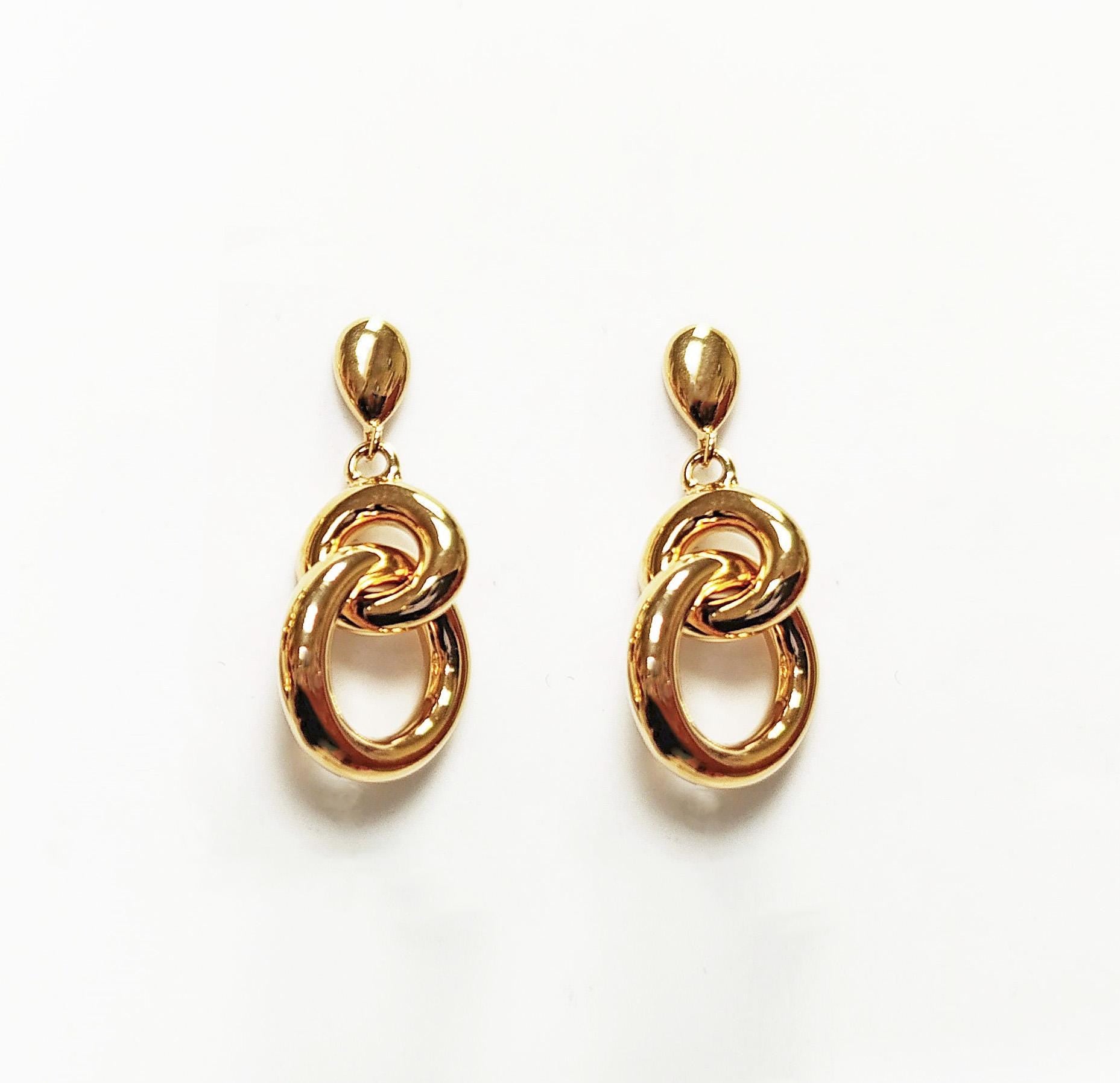 Double gold hoop earrings • Modern 18K gold-plated drop earrings • Interlocking hoops