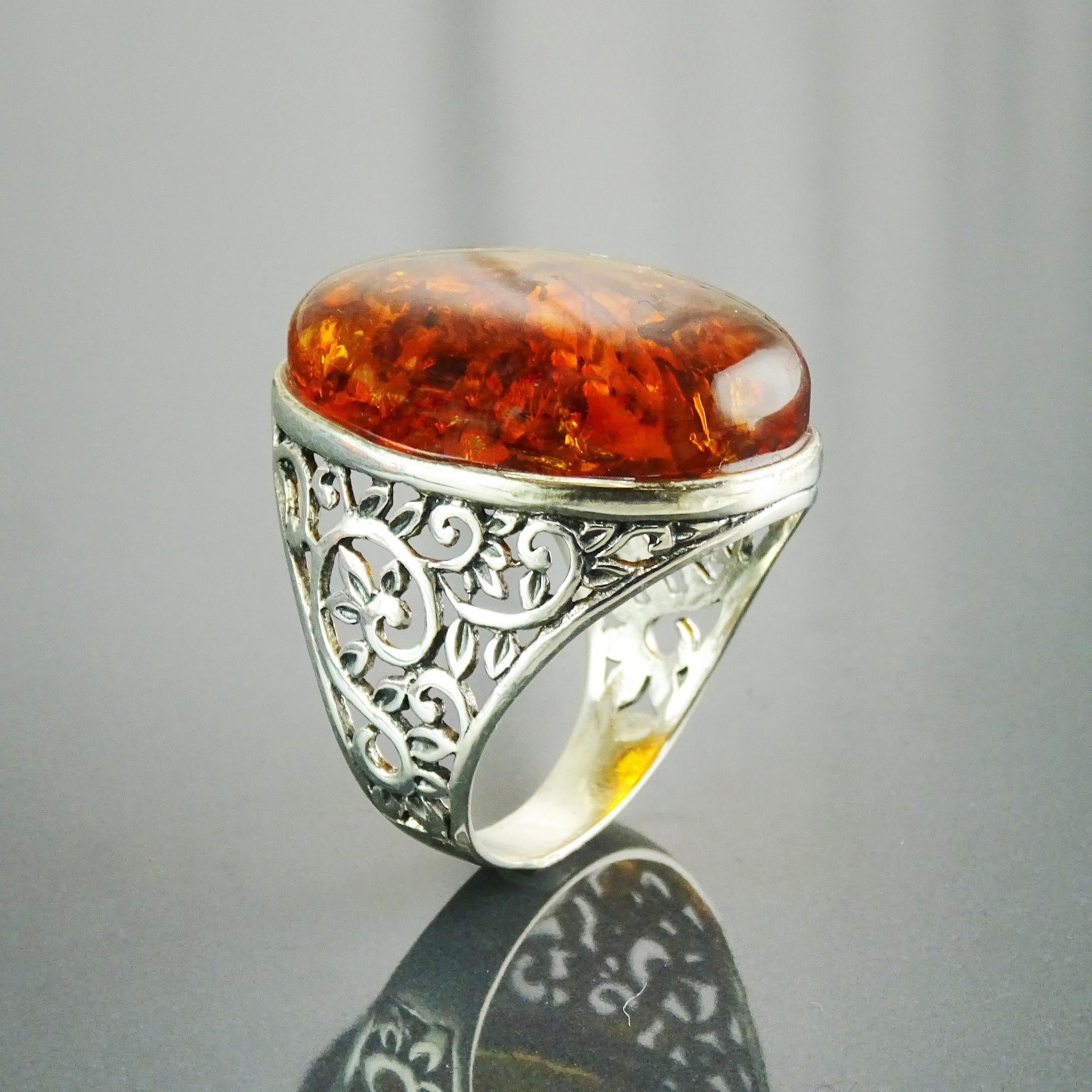 Genuine Cognac-colored Oval Amber Ring on a 925 Sterling Silver Setting