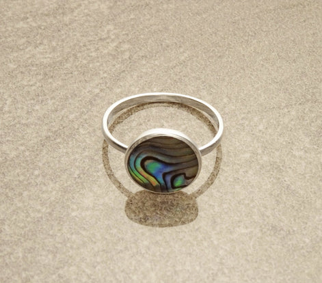 Round abalone ring, sterling silver set with genuine paua shell in a modern geometric stone design