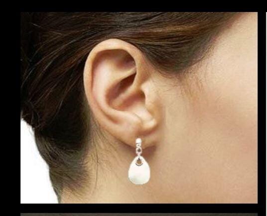 Un ensemble de boucles d'oreilles en argent 925. Les boucles d'oreilles sont en nacre blanche et ont une forme de larme. Bijou de qualité, fabriqué à la main, par des petits créateurs de bijoux locaux reconnus (des milliers de ventes), avec des matériaux de qualité et durable. Un achat en toute confiance dans une boutique avec des milliers d'avis positifs.