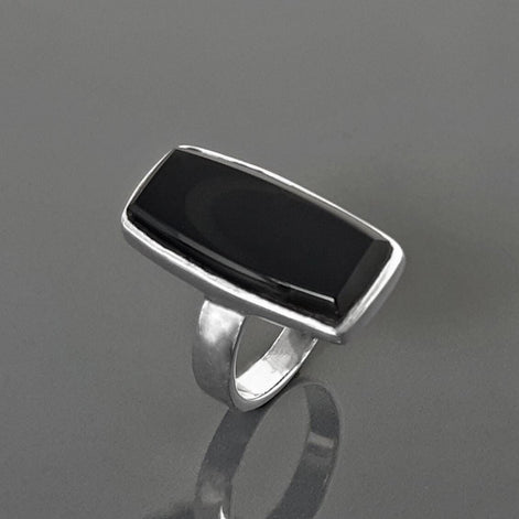 Black onyx ring, sterling silver set with a rectangle onyx stone in a unique modern design