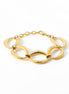 View of a Gold Oval Link Bracelet closed, on a white background
Material:  18K Gold Filled, stainless steel base
Color: yellow gold
Style: modern, elegant, statement, minimalist
Design details: large polished open oval links, smooth rounded profile, sculptural chain design, lobster clasp with extender
Best for: everyday elevated wear, statement styling, gifting, special occasions, modern jewelry lover
