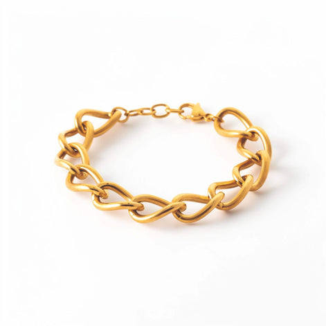 View of a Chunky Curb Chain Bracelet closed, with a studio white background
Product type: bracelet
Material:  18K Gold Filled, stainless steel base
Color: yellow gold
Style: unisex, modern, bold, minimalist
Design details: oversized oval curb links, polished finish, chunky chain silhouette, lobster clasp, extender chain
Best for: everyday wear, statement styling, gifting, layering, men, women, unisex jewelry lovers