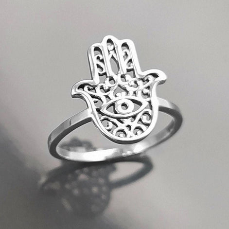Product type: ring
Material: sterling silver
Color: silver
Style: spiritual, symbolic, boho, delicate
Design details: Hamsa hand motif, centered evil eye symbol, openwork detailing, slim sterling silver band, minimalist everyday silhouette
Best for: everyday wear, symbolic jewelry lovers, spiritual gifting, protection-themed jewelry, stacking, birthdays, anniversaries, Mother’s Day