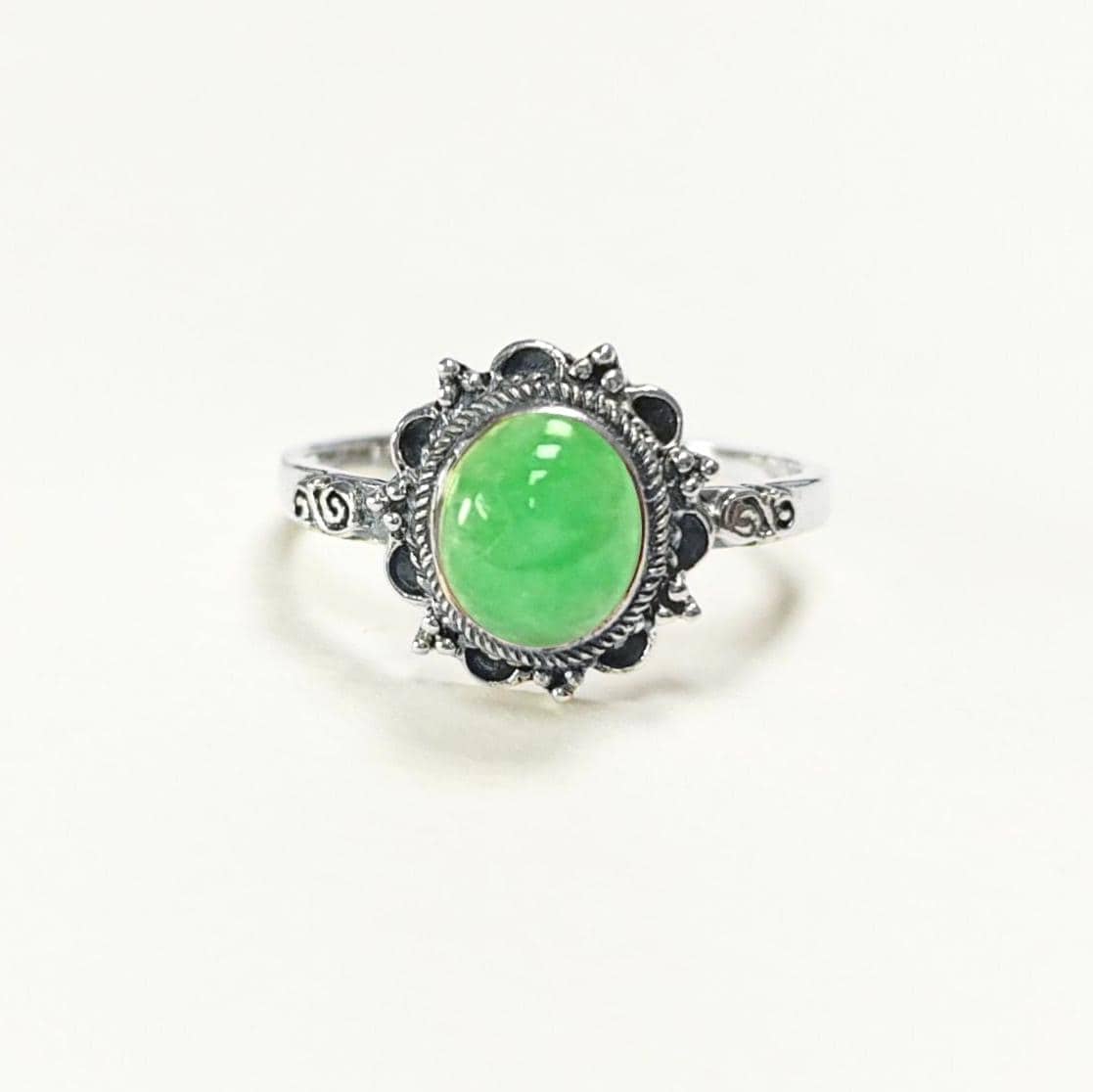 Material: sterling silver
Stone: jade
Color: silver and vivid green
Style: vintage-inspired, feminine, boho, elegant
Design details: oval jade cabochon, ornate halo-style frame, decorative sterling silver detailing, slim band, sculptural top
Best for: everyday wear, gifting, vintage jewelry lovers, jade lovers, boho styling, birthdays, anniversaries, Mother’s Day