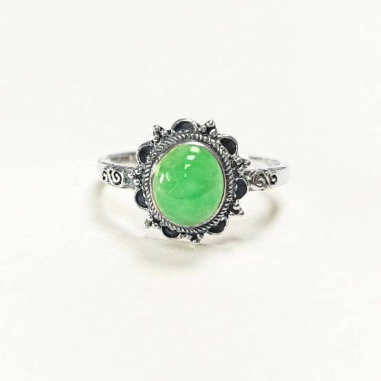 Material: sterling silver
Stone: jade
Color: silver and vivid green
Style: vintage-inspired, feminine, boho, elegant
Design details: oval jade cabochon, ornate halo-style frame, decorative sterling silver detailing, slim band, sculptural top
Best for: everyday wear, gifting, vintage jewelry lovers, jade lovers, boho styling, birthdays, anniversaries, Mother’s Day