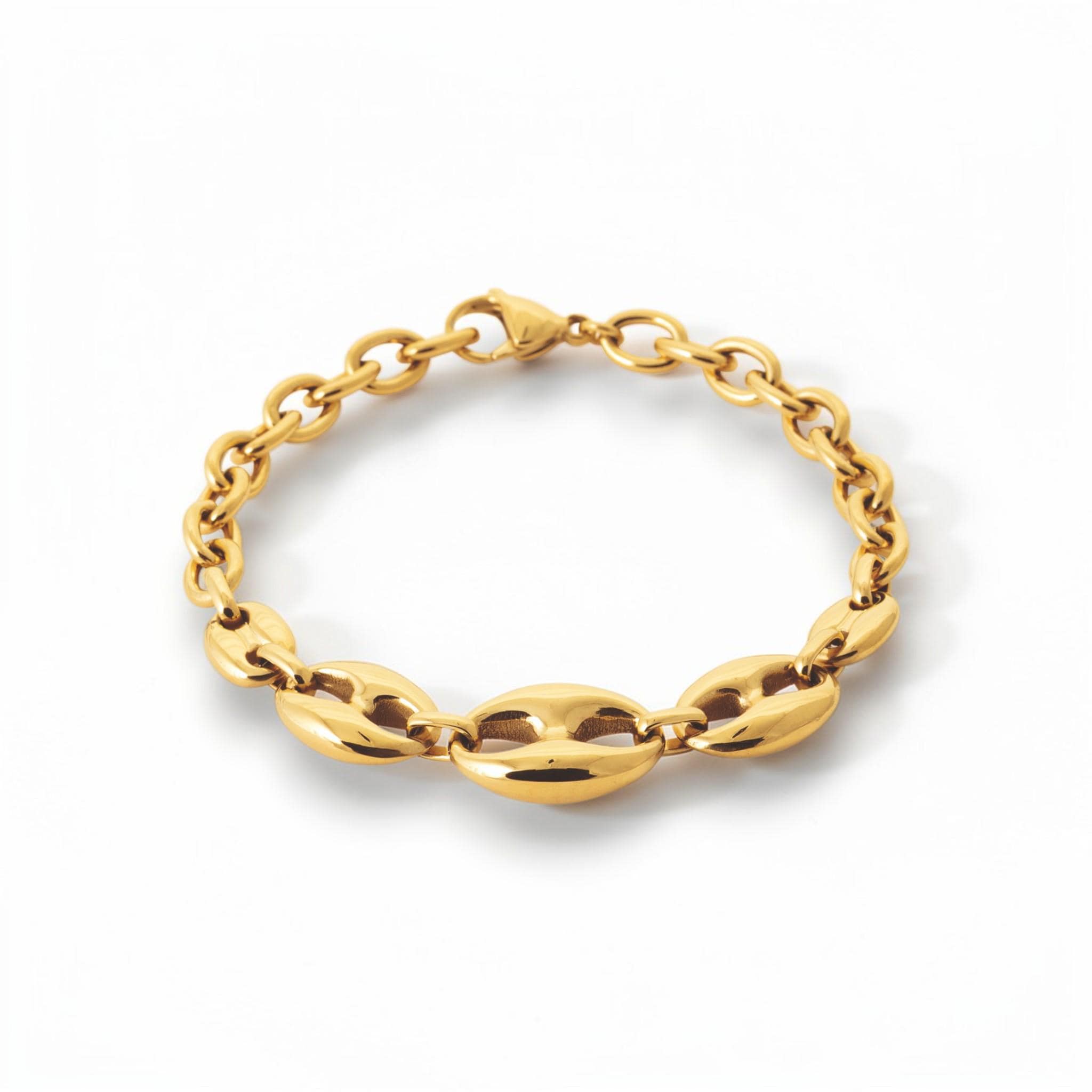 A 18K Gold Filled coffee bean link bracelet with polished oval centerpiece links and a modern rounded chain design. Elegant, minimalist, and slightly bold, it is ideal for everyday wear, layering, and gifting. Here a view of the bracelet closed.