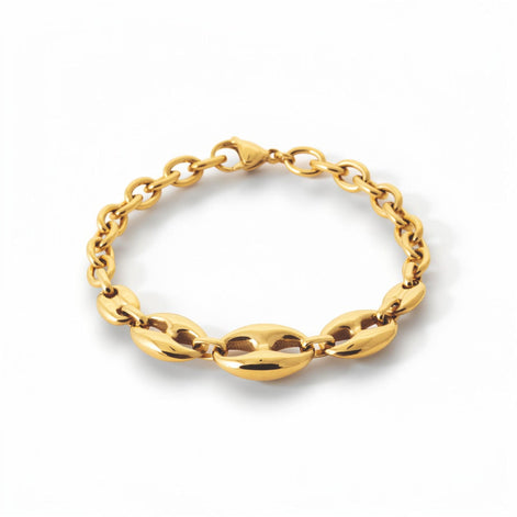 A 18K Gold Filled coffee bean link bracelet with polished oval centerpiece links and a modern rounded chain design. Elegant, minimalist, and slightly bold, it is ideal for everyday wear, layering, and gifting. Here a view of the bracelet closed.