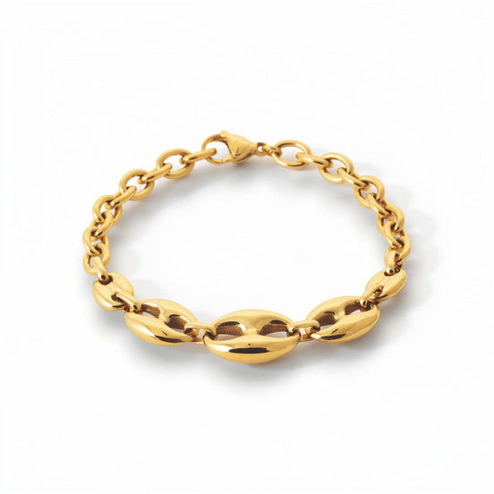 A 18K Gold Filled coffee bean link bracelet with polished oval centerpiece links and a modern rounded chain design. Elegant, minimalist, and slightly bold, it is ideal for everyday wear, layering, and gifting. Here a view of the bracelet closed.