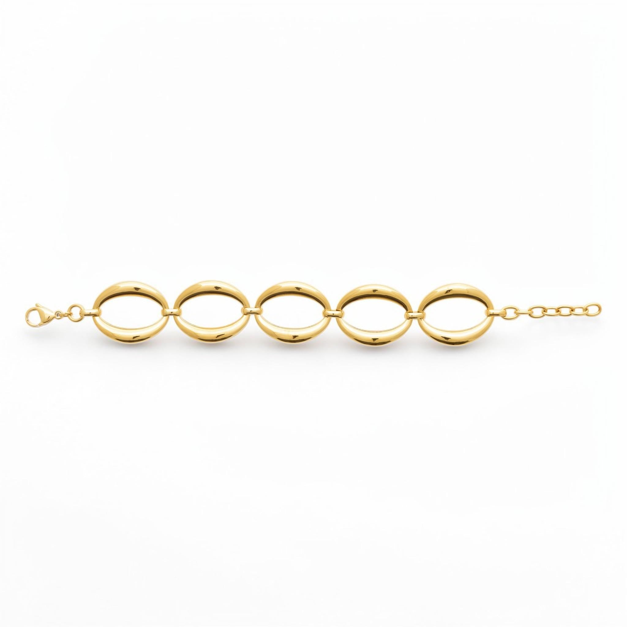 View of a Gold Oval Link Bracelet opened on a white background
Material:  18K Gold Filled, stainless steel base
Color: yellow gold
Style: modern, elegant, statement, minimalist
Design details: large polished open oval links, smooth rounded profile, sculptural chain design, lobster clasp with extender
Best for: everyday elevated wear, statement styling, gifting, special occasions, modern jewelry lover