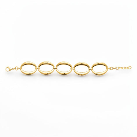 View of a Gold Oval Link Bracelet opened on a white background
Material:  18K Gold Filled, stainless steel base
Color: yellow gold
Style: modern, elegant, statement, minimalist
Design details: large polished open oval links, smooth rounded profile, sculptural chain design, lobster clasp with extender
Best for: everyday elevated wear, statement styling, gifting, special occasions, modern jewelry lover