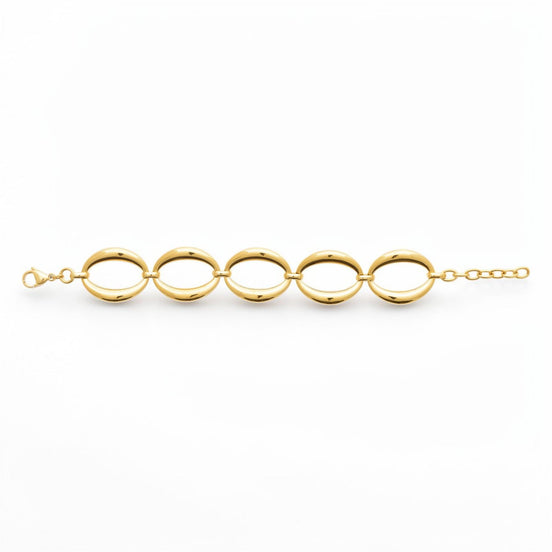 View of a Gold Oval Link Bracelet opened on a white background
Material:  18K Gold Filled, stainless steel base
Color: yellow gold
Style: modern, elegant, statement, minimalist
Design details: large polished open oval links, smooth rounded profile, sculptural chain design, lobster clasp with extender
Best for: everyday elevated wear, statement styling, gifting, special occasions, modern jewelry lover