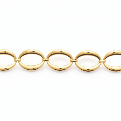 Focus view of a Gold Oval Link Bracelet on a white background
Material:  18K Gold Filled, stainless steel base
Color: yellow gold
Style: modern, elegant, statement, minimalist
Design details: large polished open oval links, smooth rounded profile, sculptural chain design, lobster clasp with extender
Best for: everyday elevated wear, statement styling, gifting, special occasions, modern jewelry lover