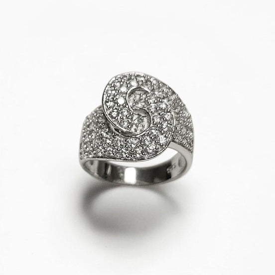 Product type: ring
Material: 925 sterling silver
Stone: diamond
Color: silver and clear white
Style: bold, statement, edgy, elegant
Design details: handcuff-inspired motif, pavé diamond surface, wide sculptural band, polished sterling silver finish, statement silhouette
Best for: statement styling, special occasions, fashion-forward looks, gift giving, women who love unique sterling silver diamond jewelry