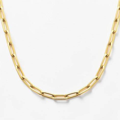 View of the matching necklace in a studio white background.
Product type: necklace
Material: 18K Gold Filled, stainless steel base
Color: yellow gold
Style: modern, elegant, minimalist, slightly bold
Design details: rectangular link chain, paperclip-style link, polished finish, lobster clasp
Best for: everyday wear, layering, gifting, modern jewelry lovers, statement minimal styling