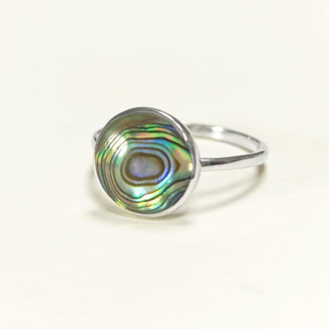 Round abalone ring, sterling silver set with genuine paua shell in a modern geometric stone design