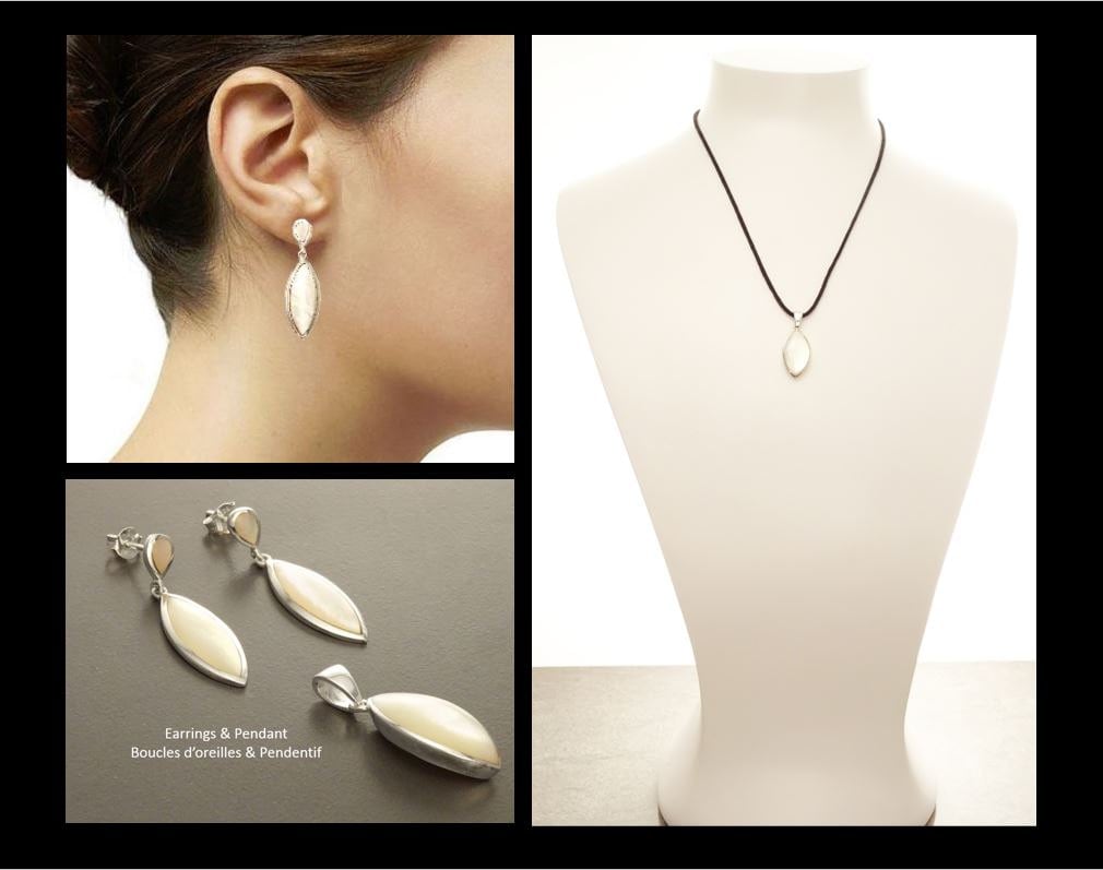 Un ensemble de boucles d'oreilles et d'un pendentif en argent avec un motif ovale en nacre blanche. Les boucles d'oreilles sont des boucles d'oreilles pendantes avec le pendentif assorti, faits main par des créateurs passionnés. KRAMIKE est une boutique validée par des milliers de ventes.